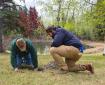 State Forester Jeremy Douse, along with Forest Inventory Lead, Dave Rhodes plant a tree outside of Department of Natural Resources in Fairbanks Alaska. 2025