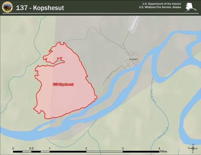 Map showing a red blob as the Kopshesut Fire perimeter about a mile west of the streets of Ambler.
