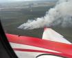 Aerial view of the Rapeseed Fire (#275) The Delta Agricultural fields are visible to the west.