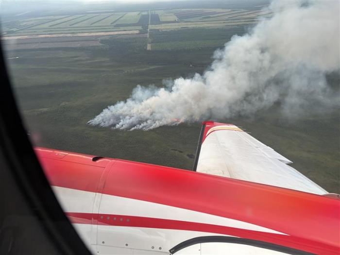 Aerial view of the Rapeseed Fire (#275) The Delta Agricultural fields are visible to the west.
