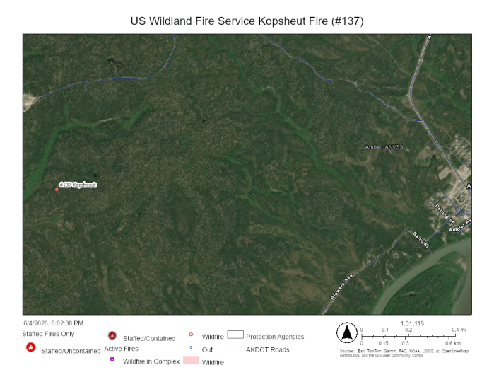 Map showing a red dot referencing the fire not far from roads in a village.