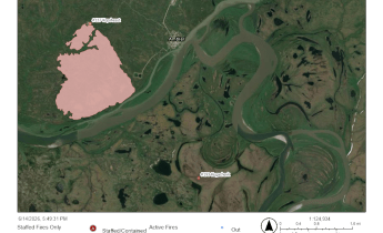 A map showing a red blob of a large fire next to Ambler and a red dot south of a river for a new fire.
