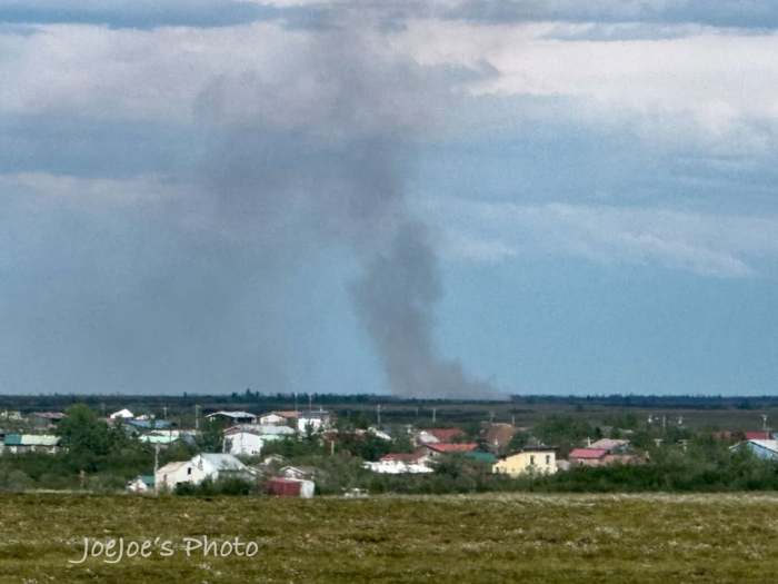 Photo of smoke column, seen from town of Bethel, AK.