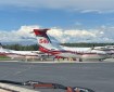 Photo of two retardant tankers on tarmac getting filled with retardant.