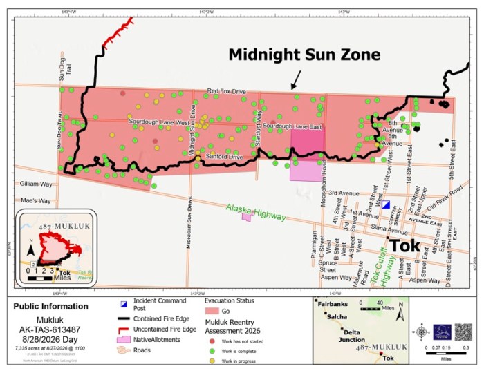 A map of the Mukluk Fire showing the fire's southern perimeter as contained black line within the community. A red shaded block shows the Go level evacuation level.
