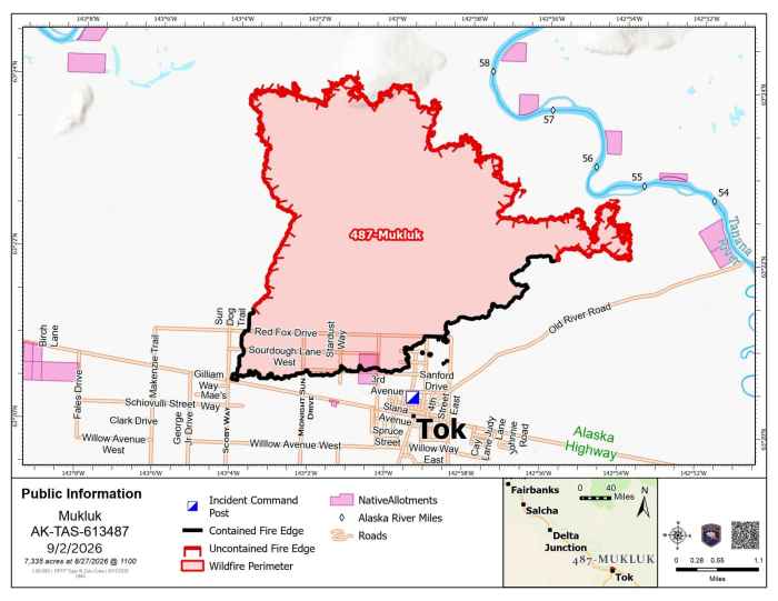 Map of the Mukluk Fire north of Tok, Alaska, showing the fire perimeter in red, contained fire edge in black, and uncontained edge in red. The map identifies the fire as 7,335 acres as of August 27, 2026, and shows its proximity to Tok, the Tanana River, Old River Road, local roads, Native allotments, and the incident command post.